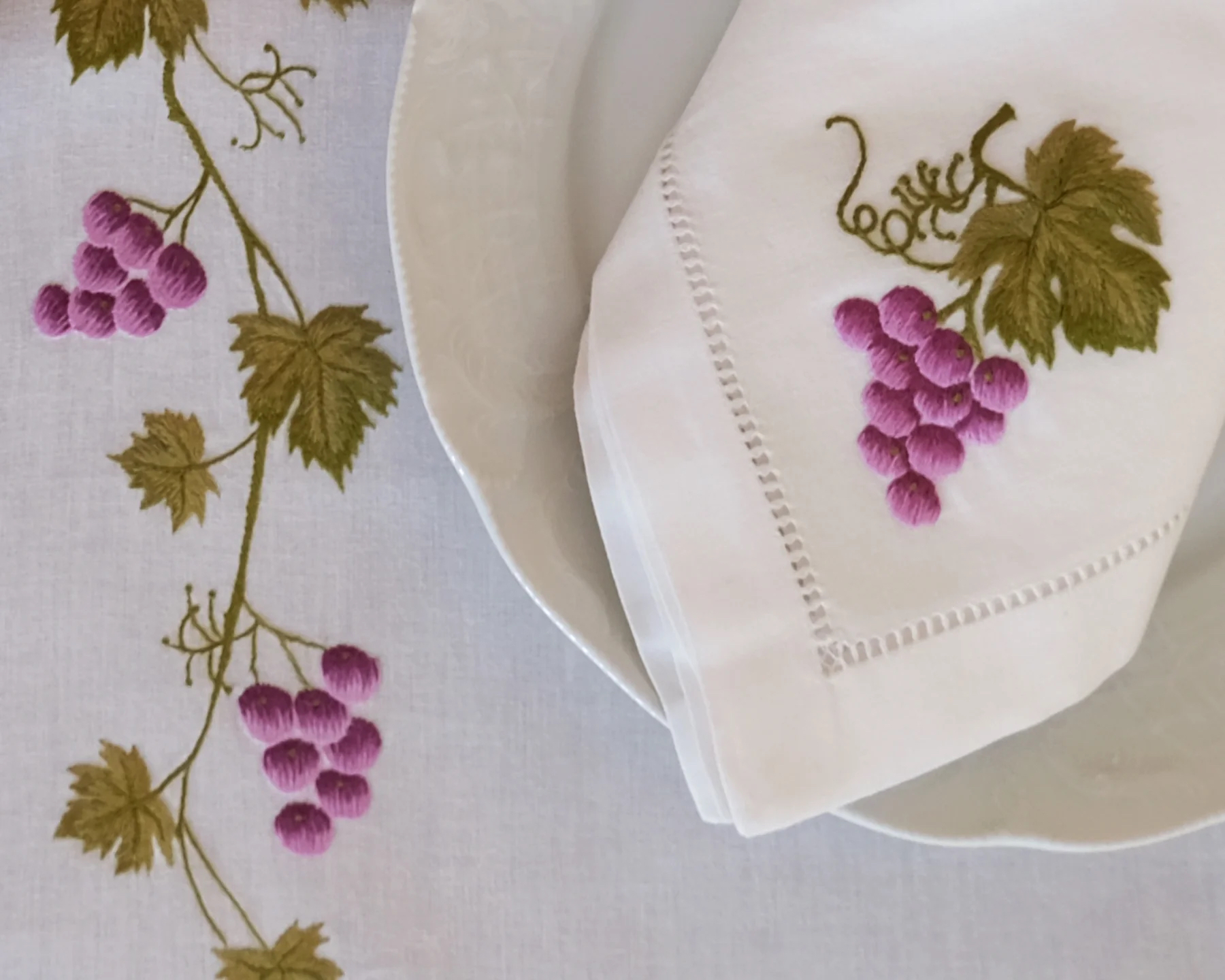 embroider grapes and vine leaves