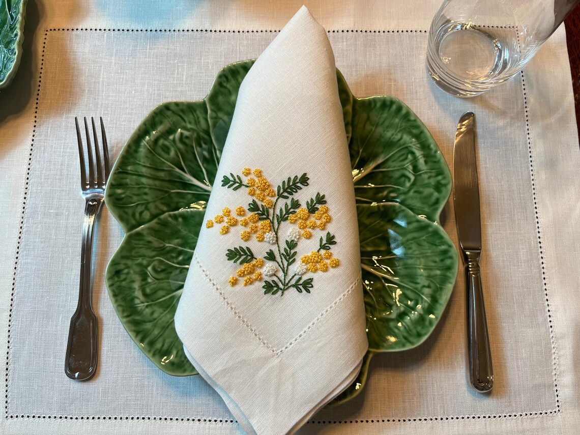 Table with hand-embroidered napkins